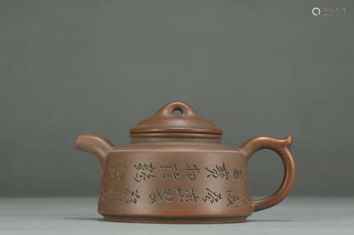 AN INSCRIBED ZISHA TEAPOT