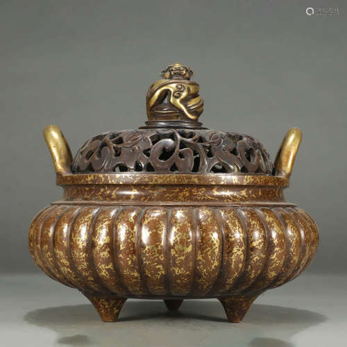 A GILT-BRONZE BEAST HANDLE TRIPOD CENSER