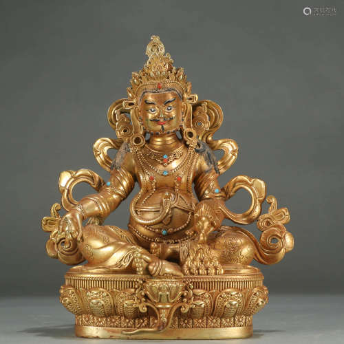 A GILT-BRONZE STATUE OF YELLOW FORTUNE GOD