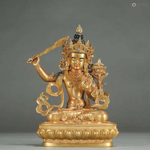 A GILT-BRONZE STATUE OF MANJUSRI BODHISATTVA