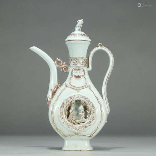 AN UNDERGLAZED RED PORCELAIN EWER