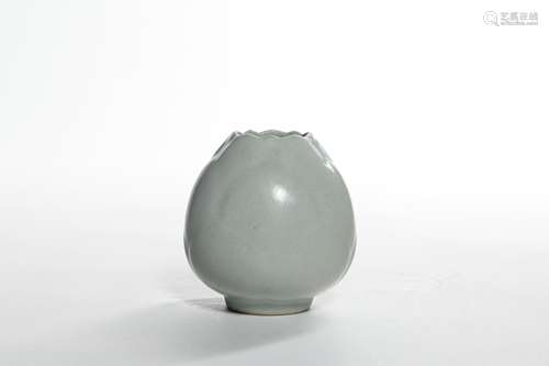 A CELADON GLAZED PORCELAIN VASE