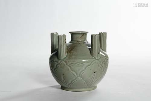 A CELADON GLAZED PORCELAIN VASE