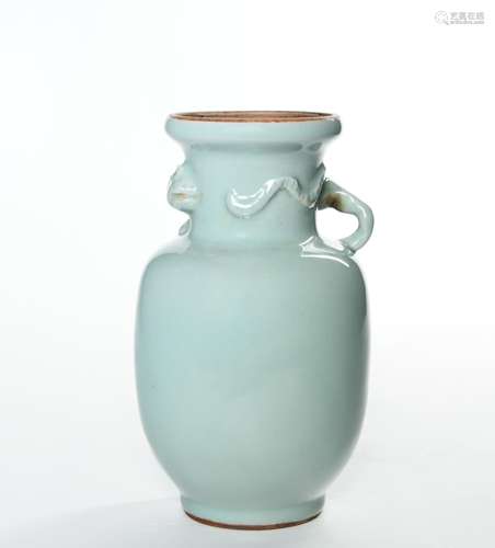 A CELADON GLAZED PORCELAIN VASE