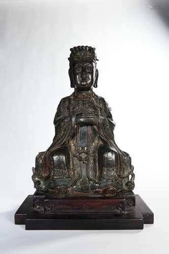 CHINESE BRONZE DAOIST FIGURINE ON WOODEN STAND