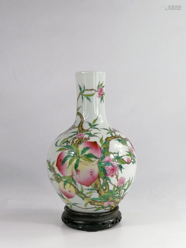 A Chinese famille rose peach and bat vase