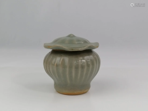A Ming dynasty Longquan celadon lotus leaf Jar