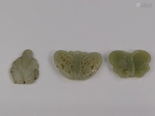 A group of Chinese white and green jade pendant