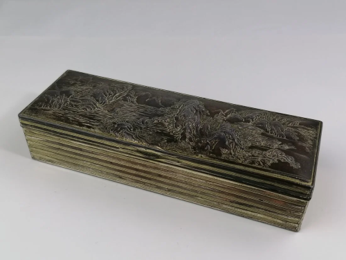 A Japanese metal carved pencil/tool box