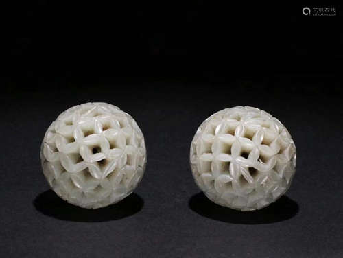 CHINESE WHITE JADE CARVED BALL IN OPEN WORK