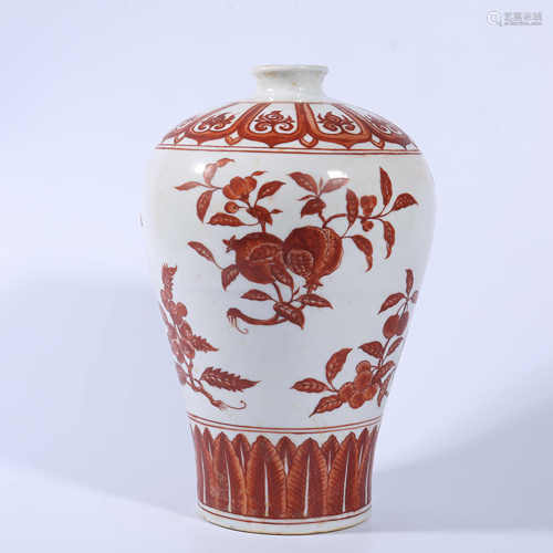 Red colored plum vase with melon and fruit pattern in Qing Dynasty