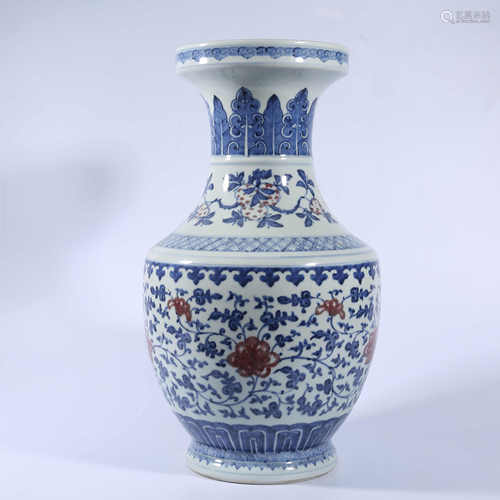 Qing Dynasty Qianlong blue and white underglaze red lotus vase