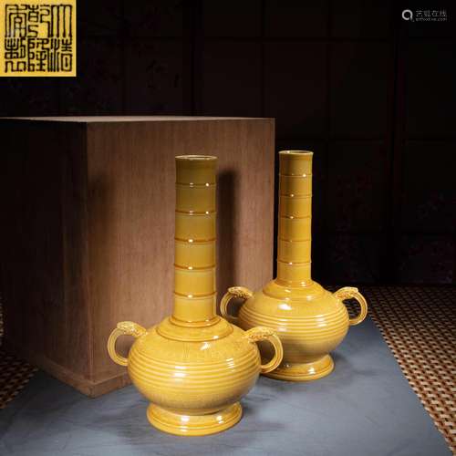 A PAIR OF CHINESE YELLOW CARVED VASES, QING DYNASTY