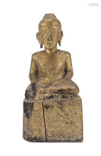 A LAOTIAN BLACK AND GOLD LAQUER WOOD SCULPTURE OF BUDDHA.