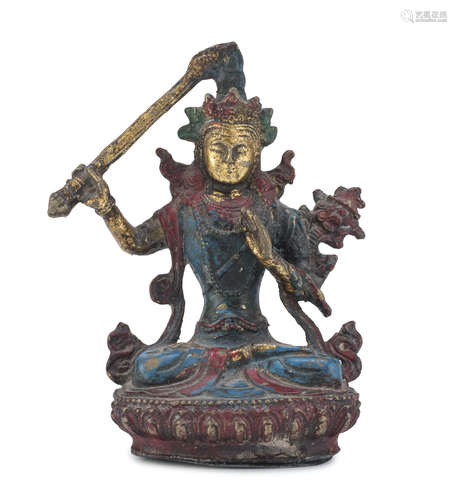 A TIBETAN PAINTED BRONZE SCULPTURE OF MANJUSRI. 20TH CENTURY.