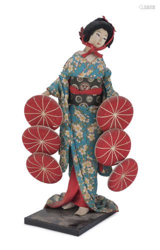A JAPANESE PAINTED AND EMBROIDERED SILK DOLL. 20TH CENTURY.