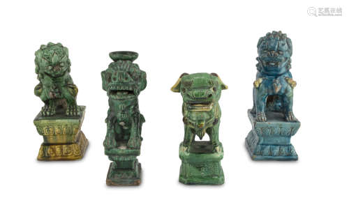 A SET OF FUOR CHINESE GLAZED CERAMIC SCULPTURES DEPICTING BUDDHIST LIONS. 20TH CENTURY.