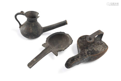 THREE PERSIAN BRONZE OIL LAMPS 19TH CENTURY.