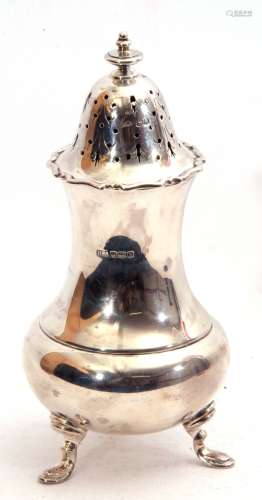 George V solid silver sugar caster of baluster form, the pierced pull off lid with wavy rim and