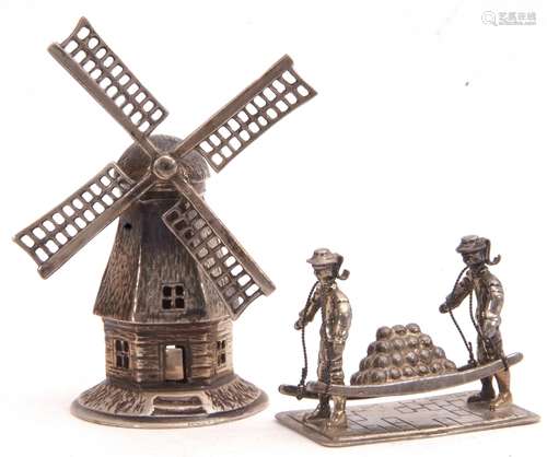 Mixed Lot: novelty Dutch white metal windmill, 7cm tall, together with a Continental white metal