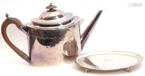 George III oval tea pot engraved with medallions, leaves and two vacant cartouches, having angular