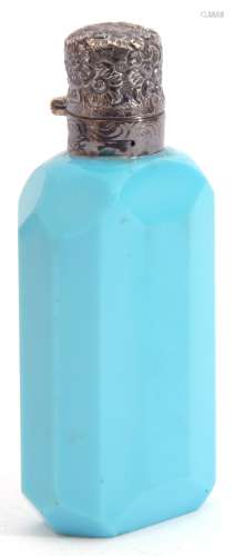 Late Victorian faceted sky blue milk glass scent bottle with embossed and hinged silver lid, 8.5cm