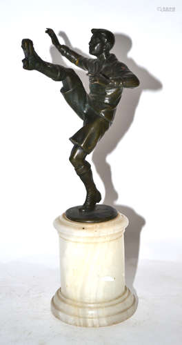 Bronze footballer on quartz plinth, 21cm high