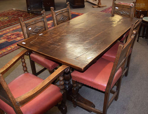 20th century small oak refectory style dining table with panelled top, turned baluster end supports,