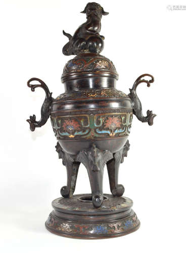 Large metal bronzed jar and cover with lion finial, decorated in cloisonne style, standing on