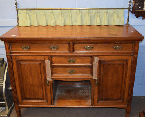 Late 19th century mahogany sideboard having brass rail and curtained back, two long and two short