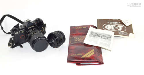 Box containing quantity of camera lenses and equipment including Casina camera