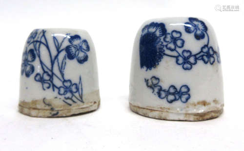 Pair of Chinese porcelain inkwells, both decorated in underglaze blue with floral designs