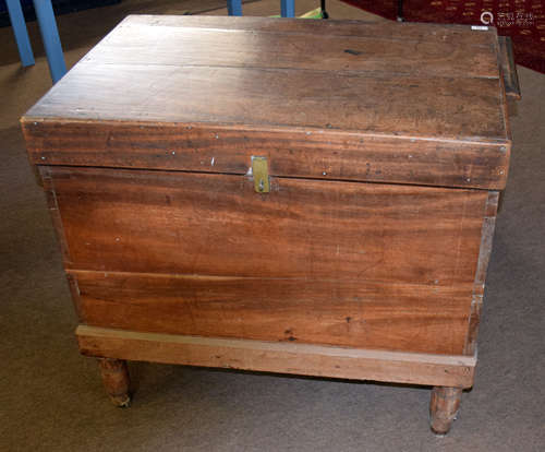 19th century mahogany storage trunk with later stand, the hinged lid opening to reveal a plain