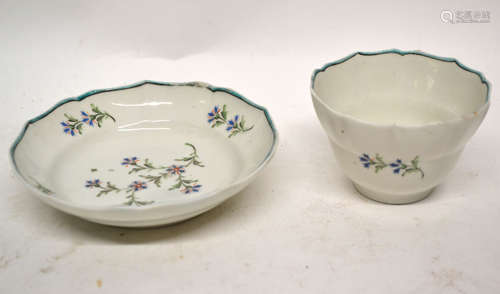 Lowestoft porcelain tea bowl and saucer, circa 1790, the tea bowl of ogee shape with decoration of