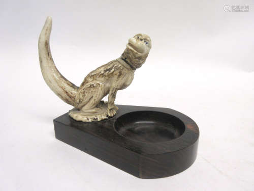 Wooden ashtray fitted with a Chinese monkey in horn, 10cm high