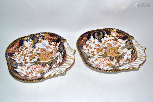 Pair of 19th century shell shaped Derby dishes with an Imari design, blue factory mark to base, 22cm