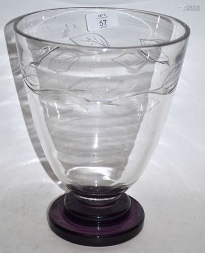 Art Deco glass vase of flared form on stepped purple base, decorated with stylised leaves in relief,