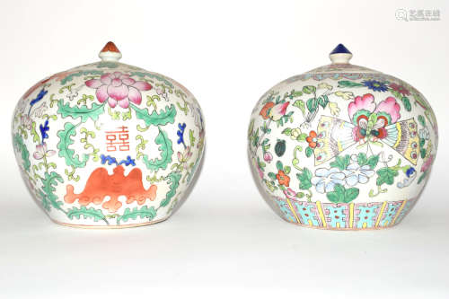 Two Chinese porcelain jars and covers decorated in polychrome with floral design (2)