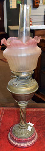 Late Victorian pink ceramic based/brass oil lamp with barley twist column, plain font and