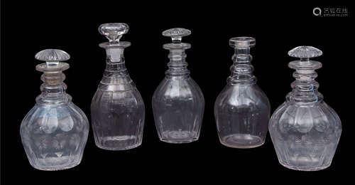 Group of four 19th century cut glass decanters with mushroom stoppers, together with a further