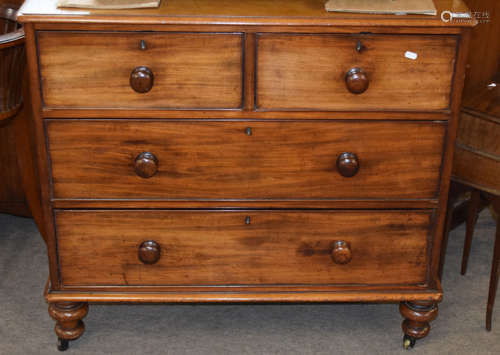 Small Victorian mahogany chest of two and two drawers with turned handles and feet, width 96cm x