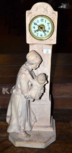 Large Dutch model of a lady and child against a model of a clock, modelled in plaster, with clock