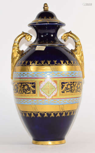 Late 19th century Vienna style porcelain vase and cover, the blue ground with gilt bordered oval