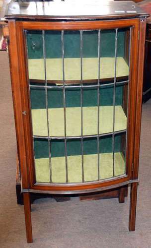 Small Edwardian mahogany display cabinet with single line inlaid, lead glazed bow front door,