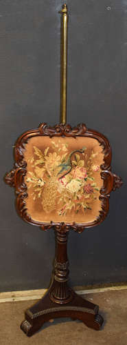 Victorian walnut pole screen, central grospoint wool emboidered panel depicting a spray of flowers