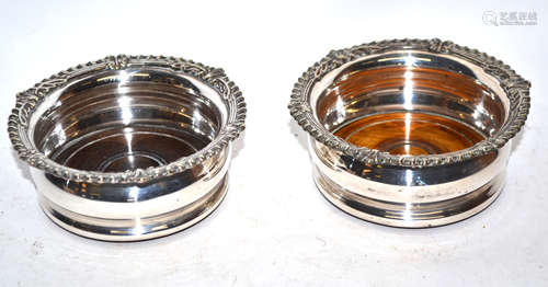 Pair of silver plated wine coasters