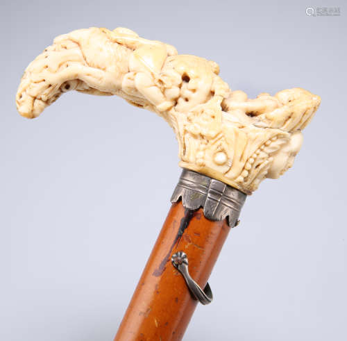 A FINE 18TH CENTURY IVORY AND MALACCA CANE