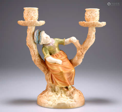 A ROYAL WORCESTER TWO-BRANCH CANDLE HOLDER