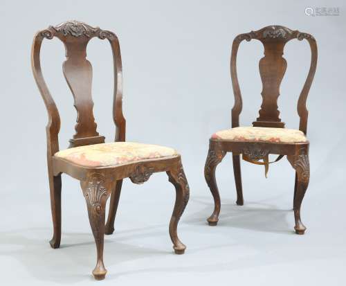 A PAIR OF GEORGE I STYLE CARVED OAK SIDE CHAIRS