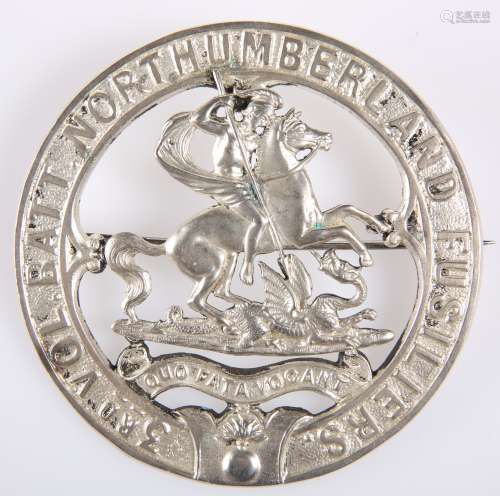A PRE-1908 PIPERS' PATTERN SILVER-PLATED PLAID BROOCH
